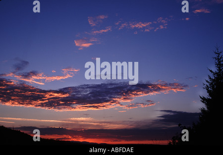 RED SUNSET CLOUDS SNOQUALMIE WASHINGTON Stock Photo
