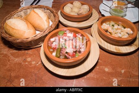 dh Arrecife Tapas lunch FOOD LANZAROTE Snack dishes Canary potatoes squid garlic prawns spain meal Stock Photo