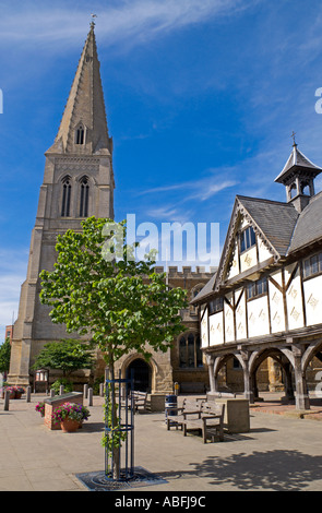 St Dionysius Parish church and the old half timbered grammar school in the deserted town centre of Market Harborough Leicestershire UK Stock Photo