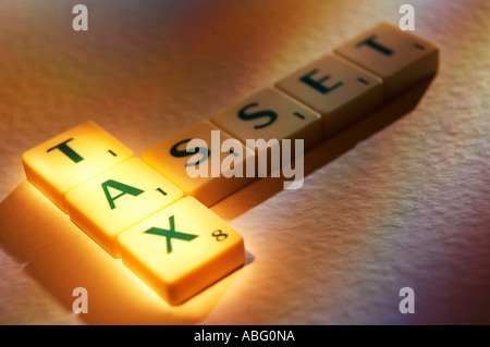 Asset management concept with letters on cubes Stock Photo - Alamy