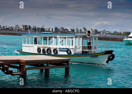 Dhoni, Maldivian transportation boat in front of Male, capital of the Maledives, Maledives Stock Photo