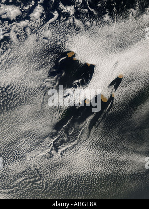 Ship wave shaped wave clouds and cloud vortices induced by the Cape Verde Islands, May 16, 2007 Stock Photo