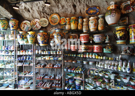 On the Amalfi coastal road interior of shop selling souvenir ceramic stopping point for tourist coach tour doing Gulf of Salerno Stock Photo