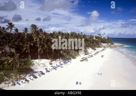 White sands and palm trees of Long Bay beach taken from Sam Lord's Castle resort St Philip parish eastern Barbados Stock Photo