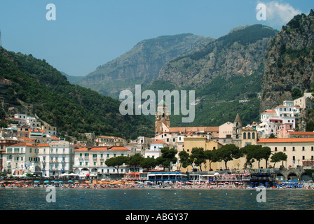 Amalfi Town seaside beach waterfront blue sky view from Tyrrhenian Sea Roman Catholic cathedral UNESCO coastal landscape Salerno Campania Italy Europe Stock Photo