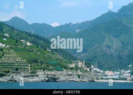 Maiori Mezzacapo Castle on UNESCO Amalfi coast urban cliff top setting backdrop mountain landscape from boat in Tyrrhenian Sea Salerno Campania Italy Stock Photo