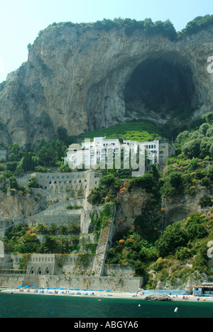 Sea view Amalfi Unesco coast at Amalfi town white Borgo Santandrea hotel on cliff Grotta dello Smeraldo cave private beach Salerno Campania Italy Stock Photo