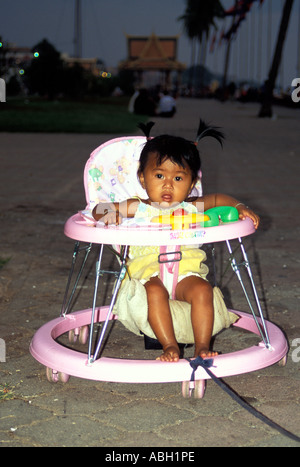 Baby in buggy at waterfront, Phnom Penh, Cambodia Stock Photo