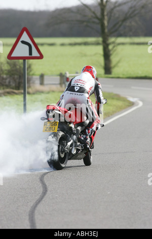 biker doing a burnout Stock Photo