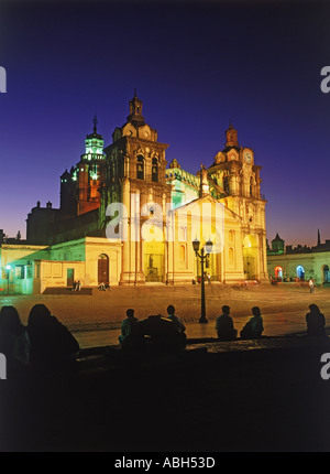 Cordoba Cathedral at night with people in Plaza San Martin in Cordoba Argentina Stock Photo