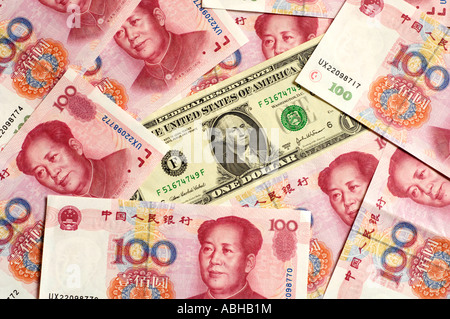 US dollar surrounded by Chinese Renminbi Stock Photo