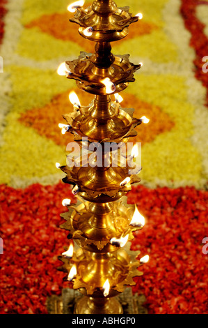 HMA78859 Flower decorations and brass lamps with fire Ayyappa Pooja Kerala India Stock Photo