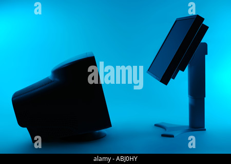 Old CRT monitor and modern LCD display Technology electronics concept Stock Photo