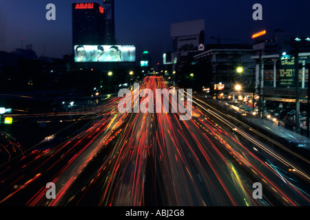 Traffic light trails in central Bangkok, Thailand Stock Photo