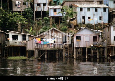 Manaus, Brazil. Poor shanty town housing; houses built on stilts to accomodate rise and fall in water level. Amazonas State. Stock Photo