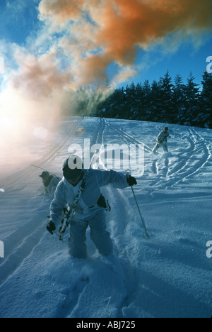 Mountain and arctic soldiers wearing camouflage in the snow and ice of the actic on exercise in the winter Stock Photo