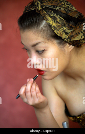 Marianne Cheesecake Burlesque Performer Applying Makeup