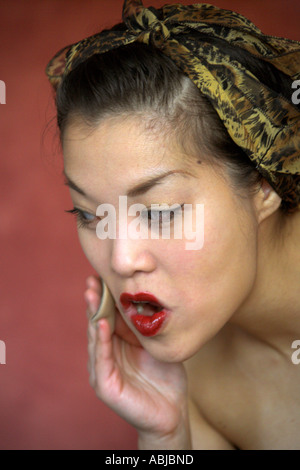 Marianne Cheesecake Burlesque Performer Applying Makeup