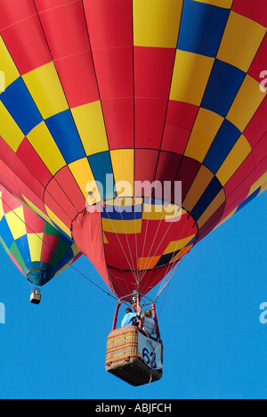 Colorful hot air balloon rising in air Stock Photo - Alamy