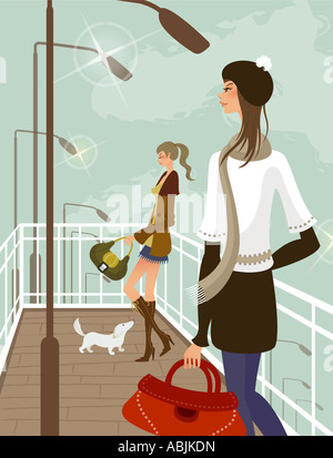 Two women holding hand bags Stock Photo