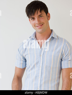 Portrait of man wearing button down shirt Stock Photo