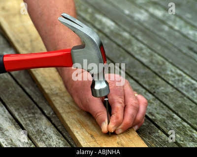 Hammer Hitting Nail Stock Photo