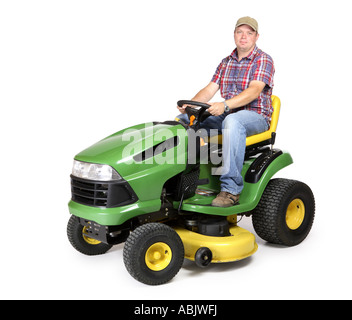 Lawn tractor with man riding cut out on white background Stock Photo