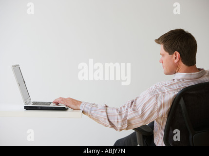 Businessman using laptop Stock Photo