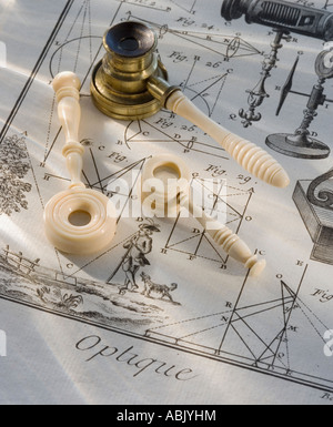 Old fashioned magnifying glasses on diagram Stock Photo