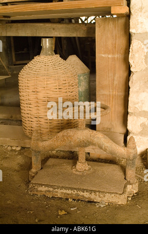 Press and Storage Jar, Cellar of The Greathouse, Whim Plantation, St Croix, US Virgin Islands Stock Photo