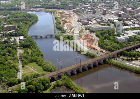 Aerial view of railroad bridge over Raritan River near City of New Brunswick, New Jersey, U.S.A. Stock Photo