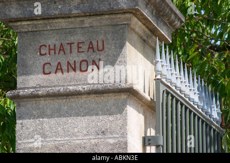 Stone gate posts and iron gate to one of the buildings of Chateau Canon  Saint Emilion  Bordeaux Gironde Aquitaine France Stock Photo