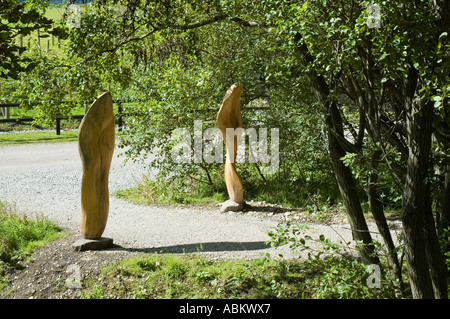 Wood carving of giant leaves, on the Sculpture Trail at the Crich Tramway Village, near Matlock, Derbyshire, England, UK Stock Photo