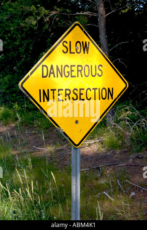 Yellow warning sign for dangerous intersection. Danbury Wisconsin WI USA Stock Photo