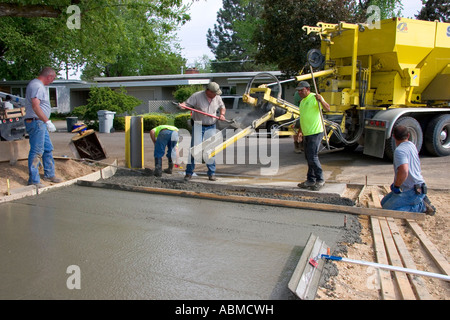 Workers pouring a cement driveway in Boise Idaho Stock Photo