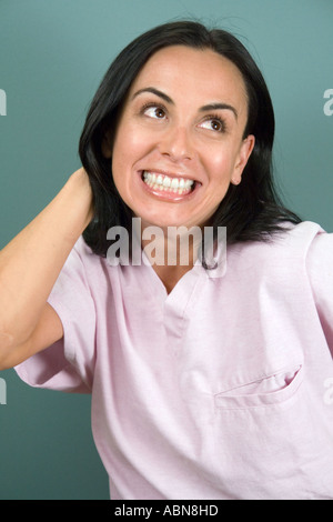 Portrait of young adult nurse excited Stock Photo