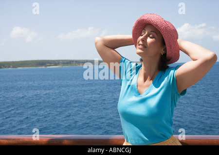 https://l450v.alamy.com/450v/abncgj/woman-sunbathing-on-deck-of-ship-abncgj.jpg