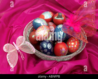 Butterflies and Easter Eggs on Pink Silk Stock Photo