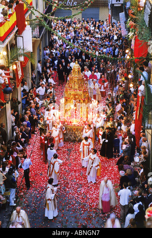 Corpus Christi celebrations with confetti falling on streets of Valencia, Spain Stock Photo