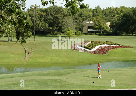 Tarpon Springs Florida Westin Innisbrook Resort Copperhead Golf Course woman golfer red shirt Stock Photo