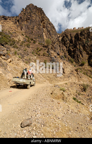 fourwheeldrive vehicle on a dirtroad in the jemenian mountains Yemen Stock Photo