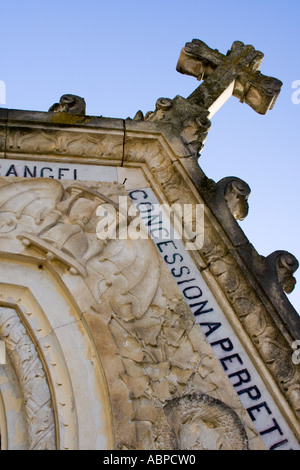 Crypt and cross in the sun, from an angle Stock Photo - Alamy