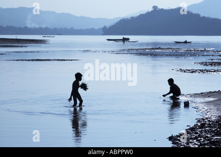 Boys Playing In River, Luang Prabang Stock Photo