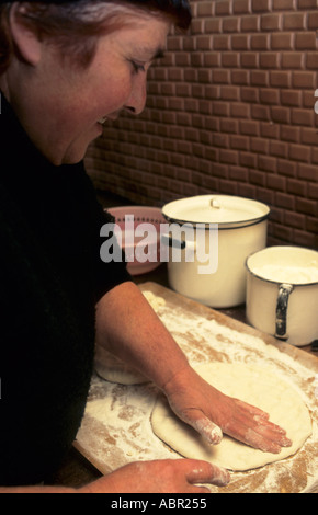 Nr Poti, Georgia. Woman making bread. Stock Photo