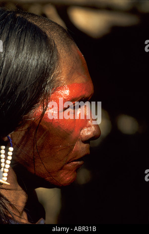 Para State, Brazil. Kayapo warrior from A-Ukre village with face paint and bead ear rings at Altamira. Stock Photo