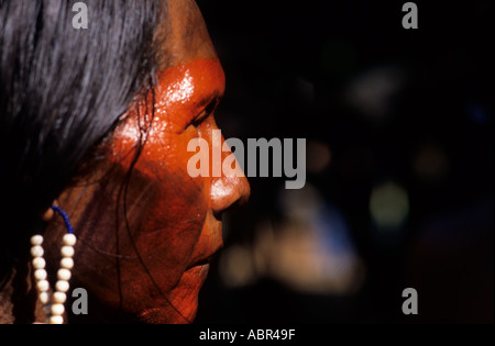 Para State, Brazil. Kayapo warrior from A-Ukre village with face paint and bead ear rings at Altamira. Stock Photo