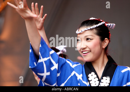 Female japanese dancer performs a traditional fan dance in Hamburg, Germany Stock Photo