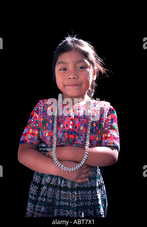 Portrait of a young Maya girl in traditional stlye costume of her community San Pedro Sacatepequez Guatemala Central America Stock Photo