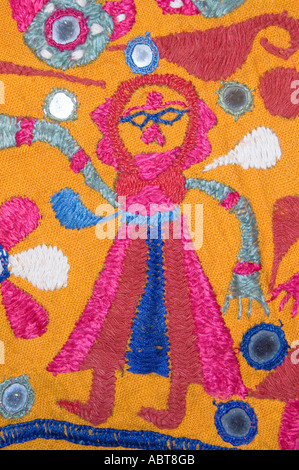 Detail of an embroidered wall hanging Textile from Rajahstan India Dancing woman Stock Photo