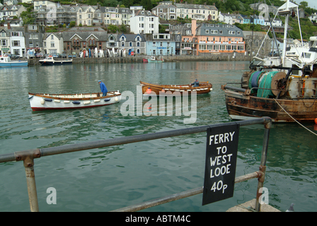 The Fishing Harbour Town of West Looe with Trawler and Small Ferry Boats Cornwall England United Kingdom UK Stock Photo